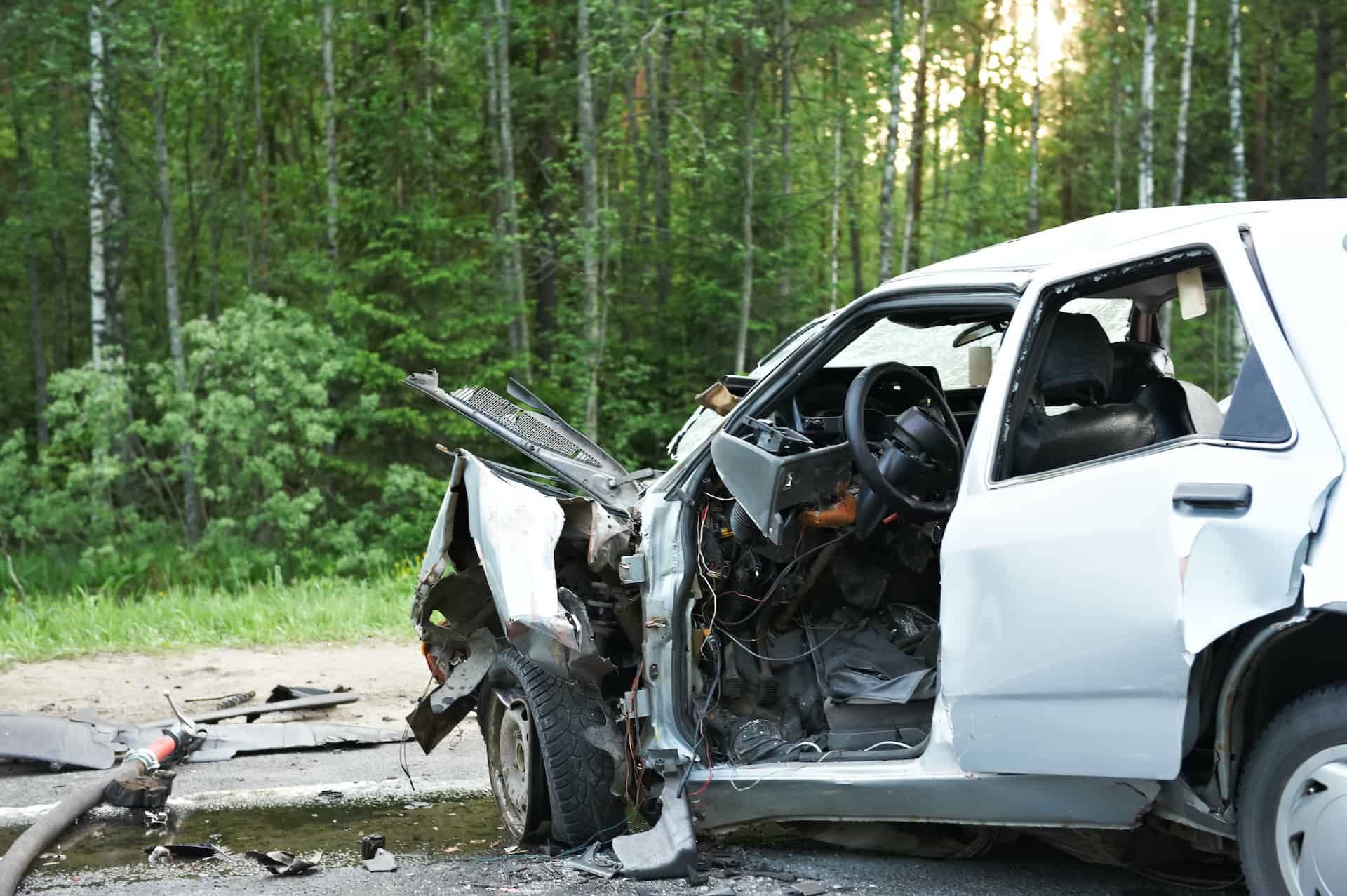car on the side of the road after a front end collision
