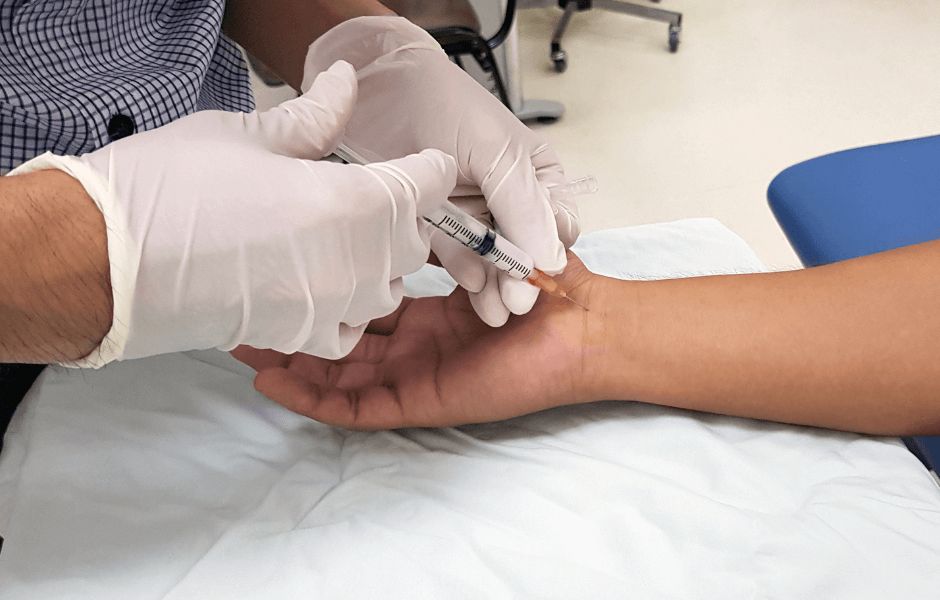 Patient receives injection in wrist for Carpal Tunnel