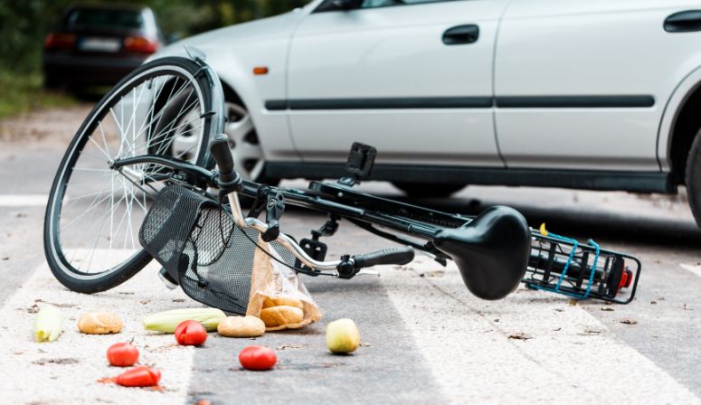 bicycle laying on road