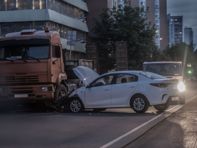 Side collision auto accident at night