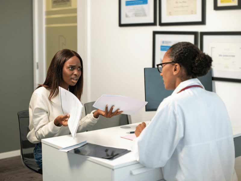 Doctor speaking to a patient